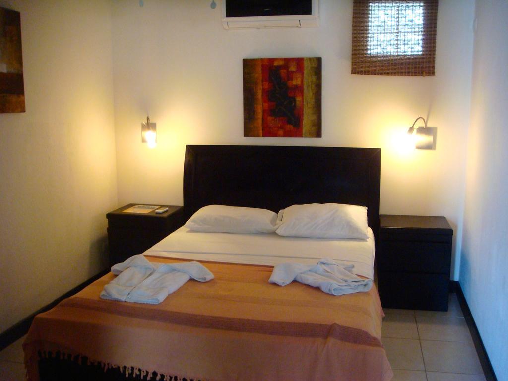 Tuanis Aparthotel Jacó Habitación foto