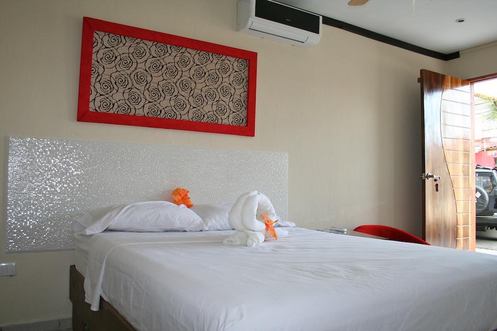 Tuanis Aparthotel Jacó Habitación foto