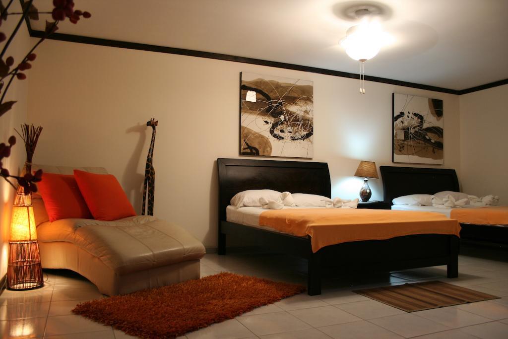 Tuanis Aparthotel Jacó Habitación foto